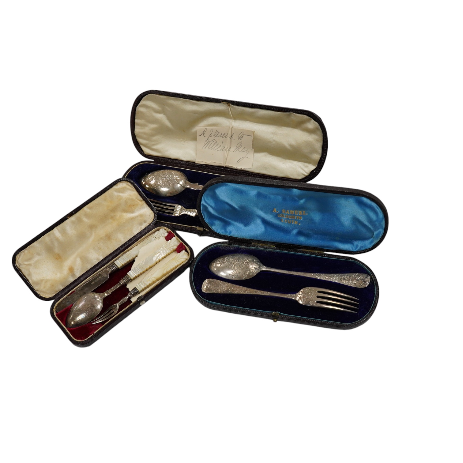 Three assorted Victorian cased silver christening sets, including London, 1880. Condition - fair.